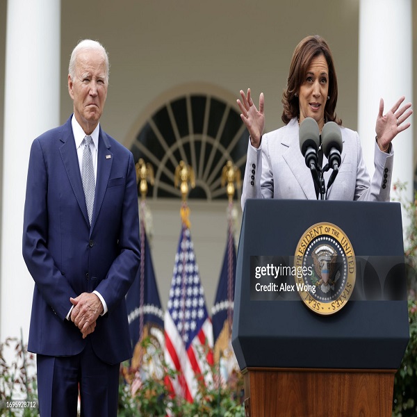 Kamala Harris standing next to Joe Biden